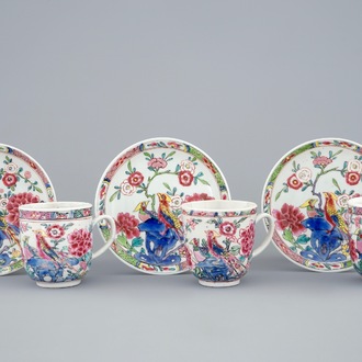 A set of three Chinese famille rose cups and saucers with bords among flowers, Yongzheng/Qianlong